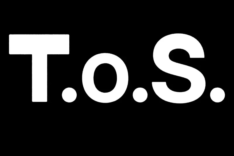 Black card reading “T.o.S.”